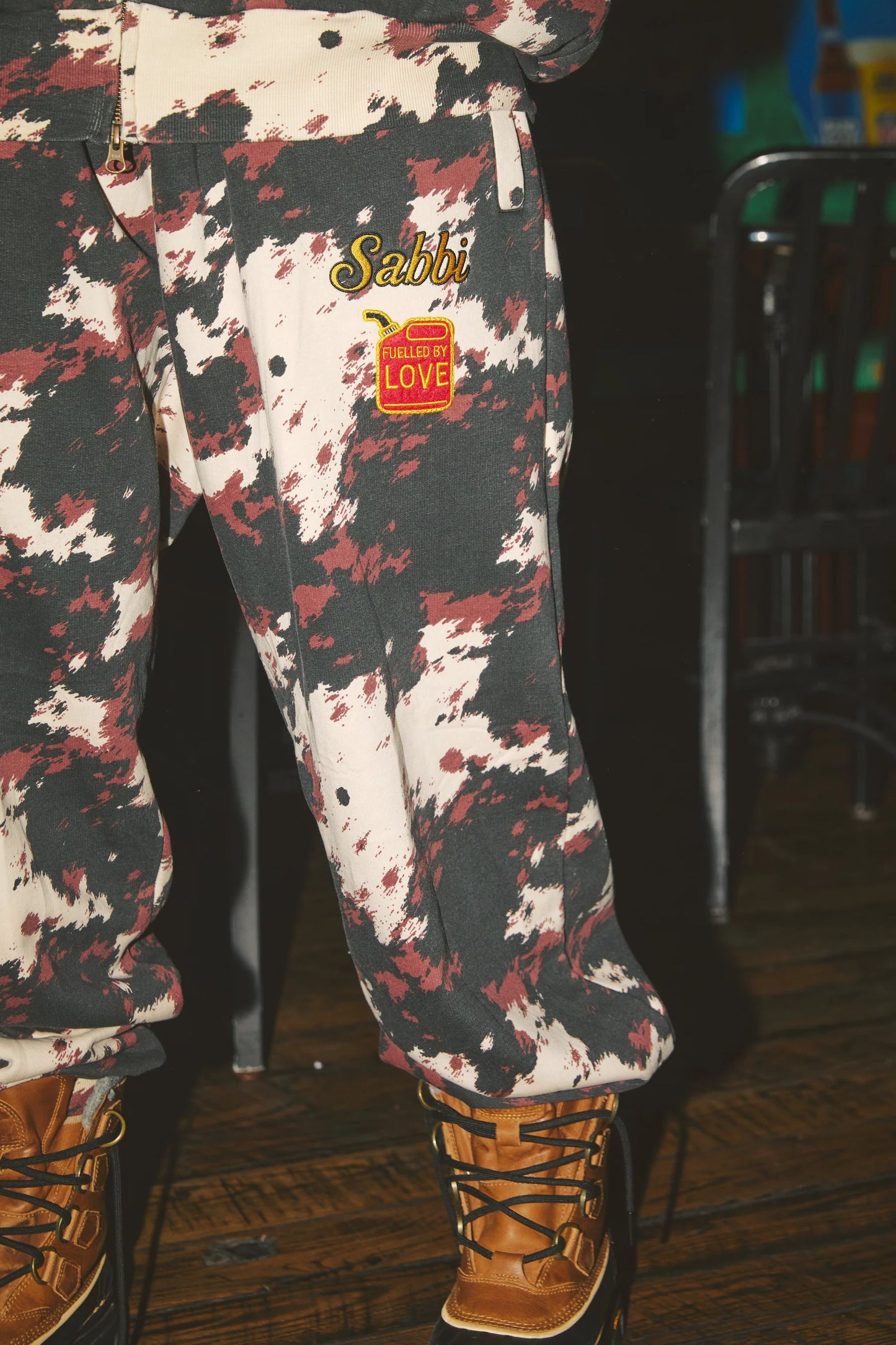 Cow Print Cuffed Sweat Pants